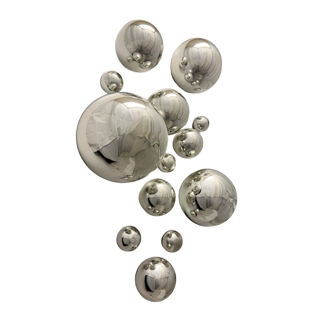 Silver set of 13 Wall Spheres.