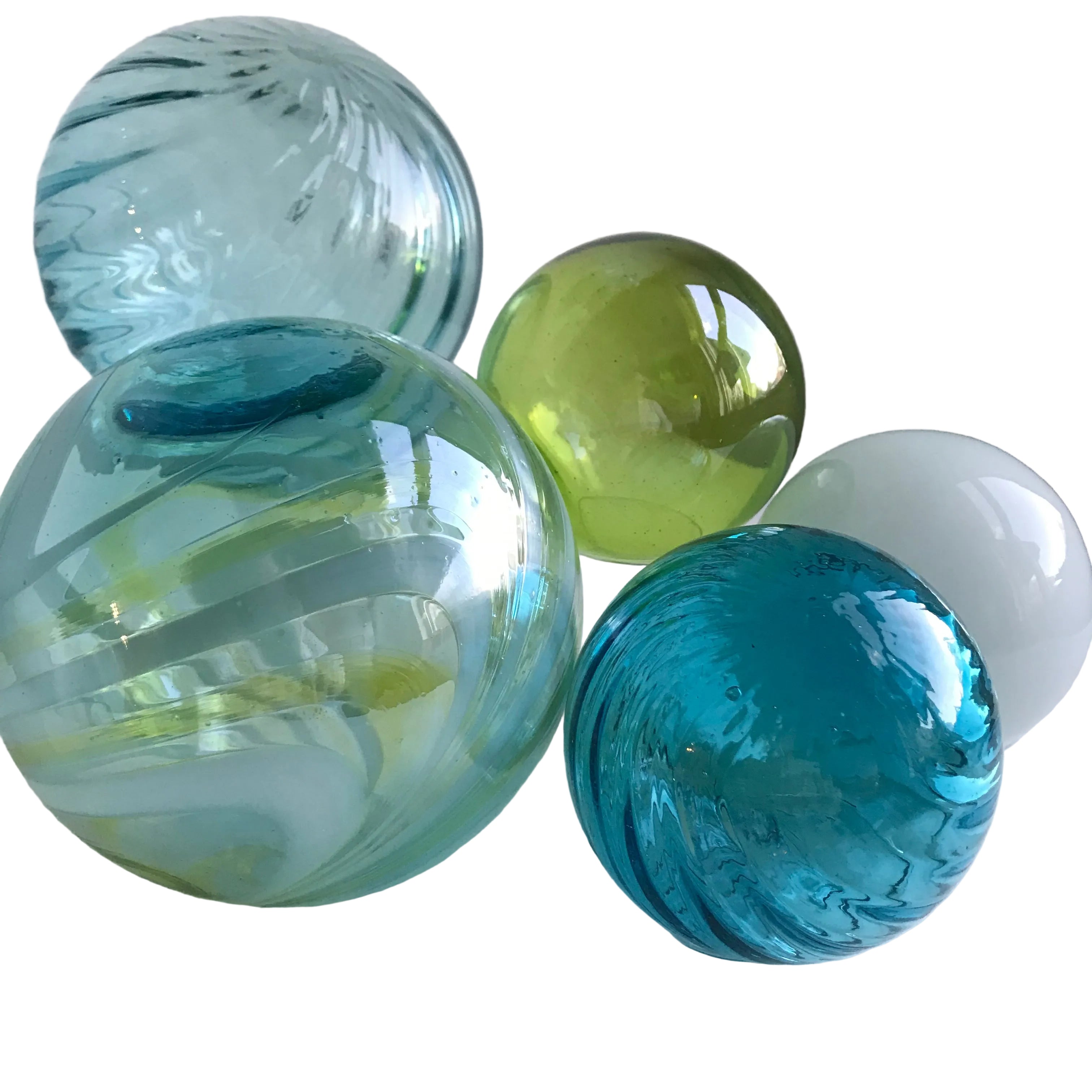 Colorful glass spheres on a white surface
