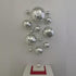 Silver set of 13 Wall Spheres.